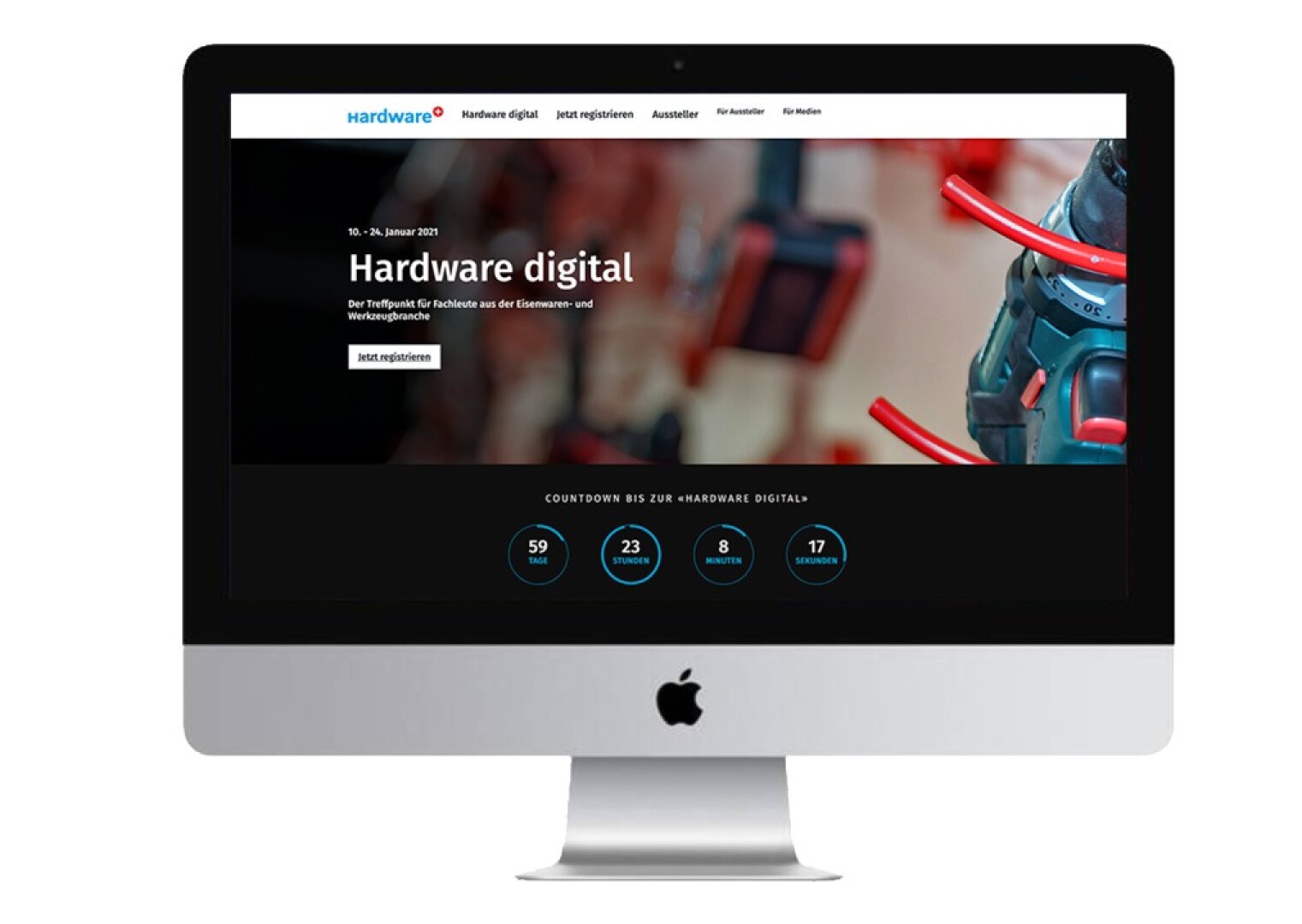 An iMac displays a website for Hardware digital, featuring event dates, a countdown timer, and close-up images of red and black hardware components in the background.